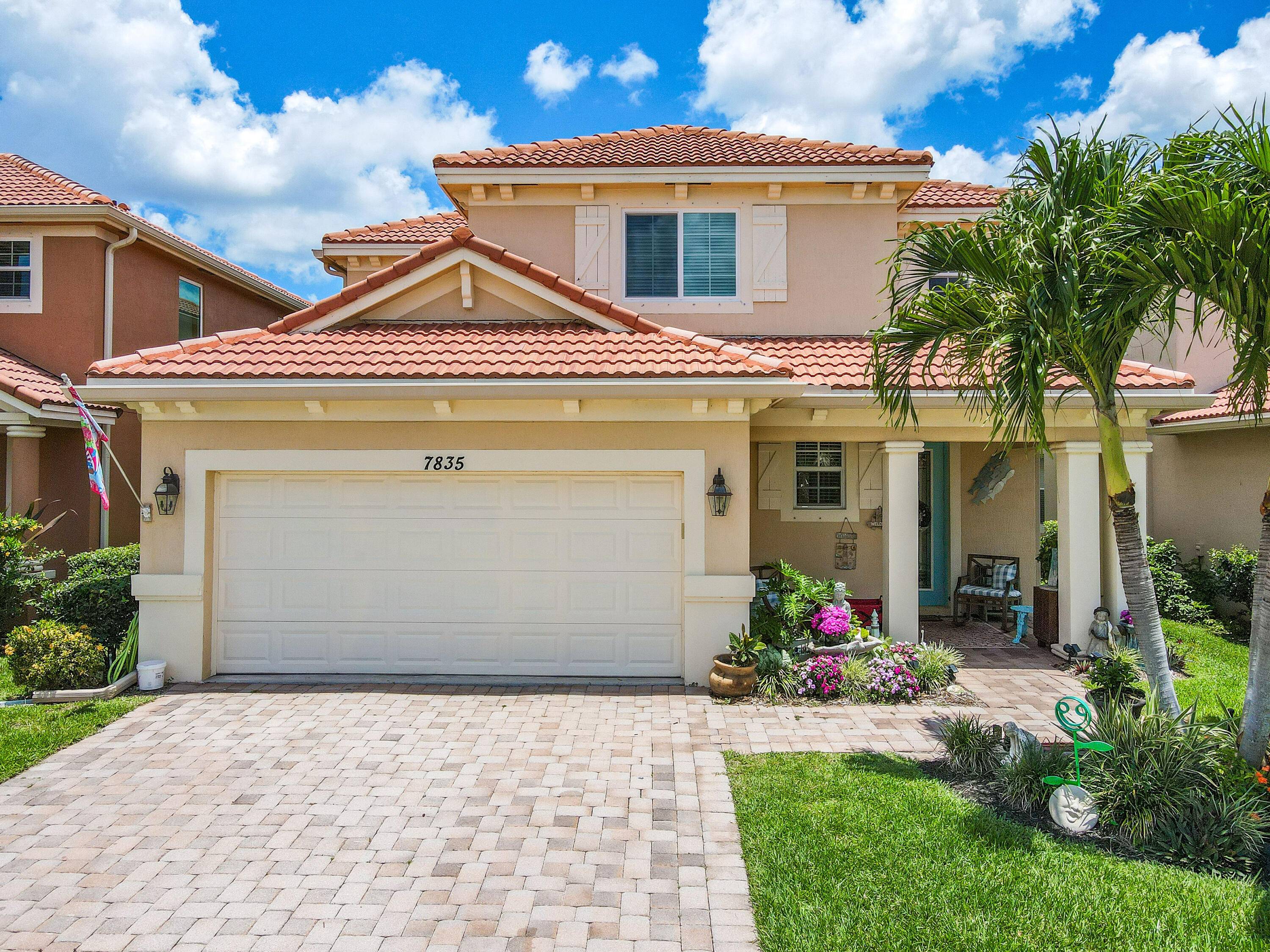 Exceptional Lake Views in The Oaks Gated Community Discover this 2, 697 sq.