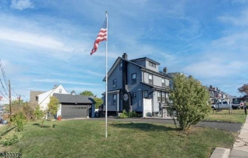 This beautifully renovated colonial sits on a LARGE CORNER LOT.