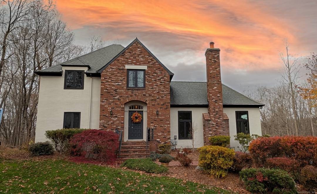 Timeless French Colonial Luxury in a Premier Ridgefield Enclave !