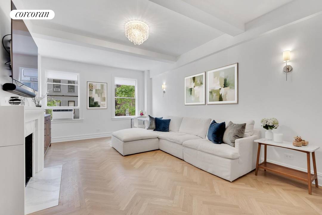 This meticulously triple mint renovated 3 bedroom, 2 bath home harmoniously blends pre war charm with modern sophistication.