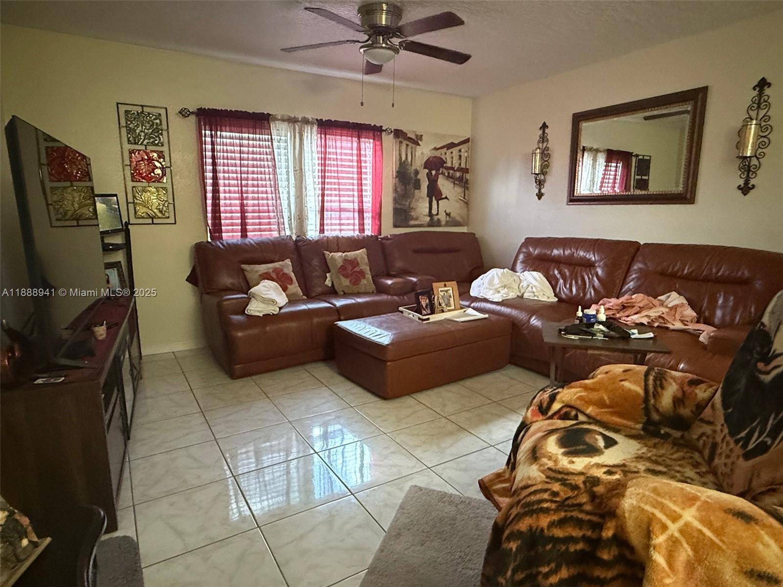 This cozy home features 3 bedrooms and 2 bathrooms, offering comfort and functionality for the entire family.