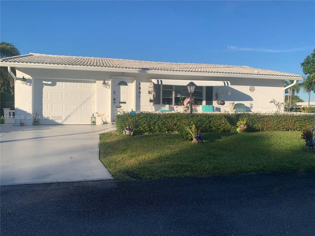 Stunning newly renovated one story gem featuring 2 bedrooms plus a den, located in the vibrant 55 community of East Boynton Beach.
