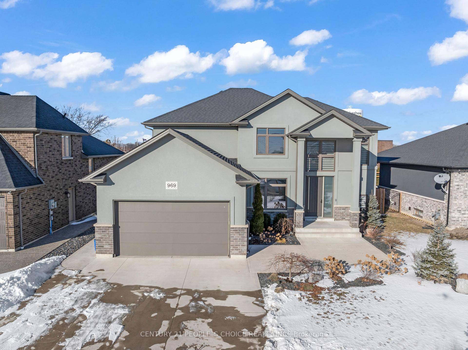 This beautifully finished two story home is situated in a highly glamorous Lakeshore neighbourhood, offering privacy with no direct rear neighbours.