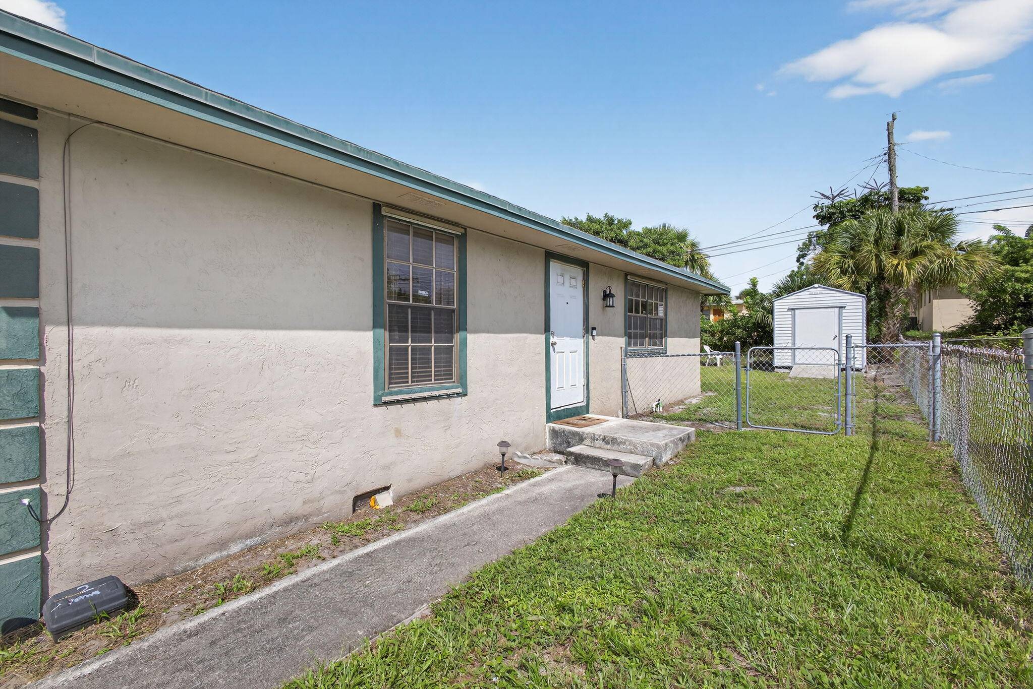 Step into this charming 2 bedroom, 1 bath home featuring central A C, in unit washer and dryer, and a fenced backyard perfect for relaxing or entertaining.