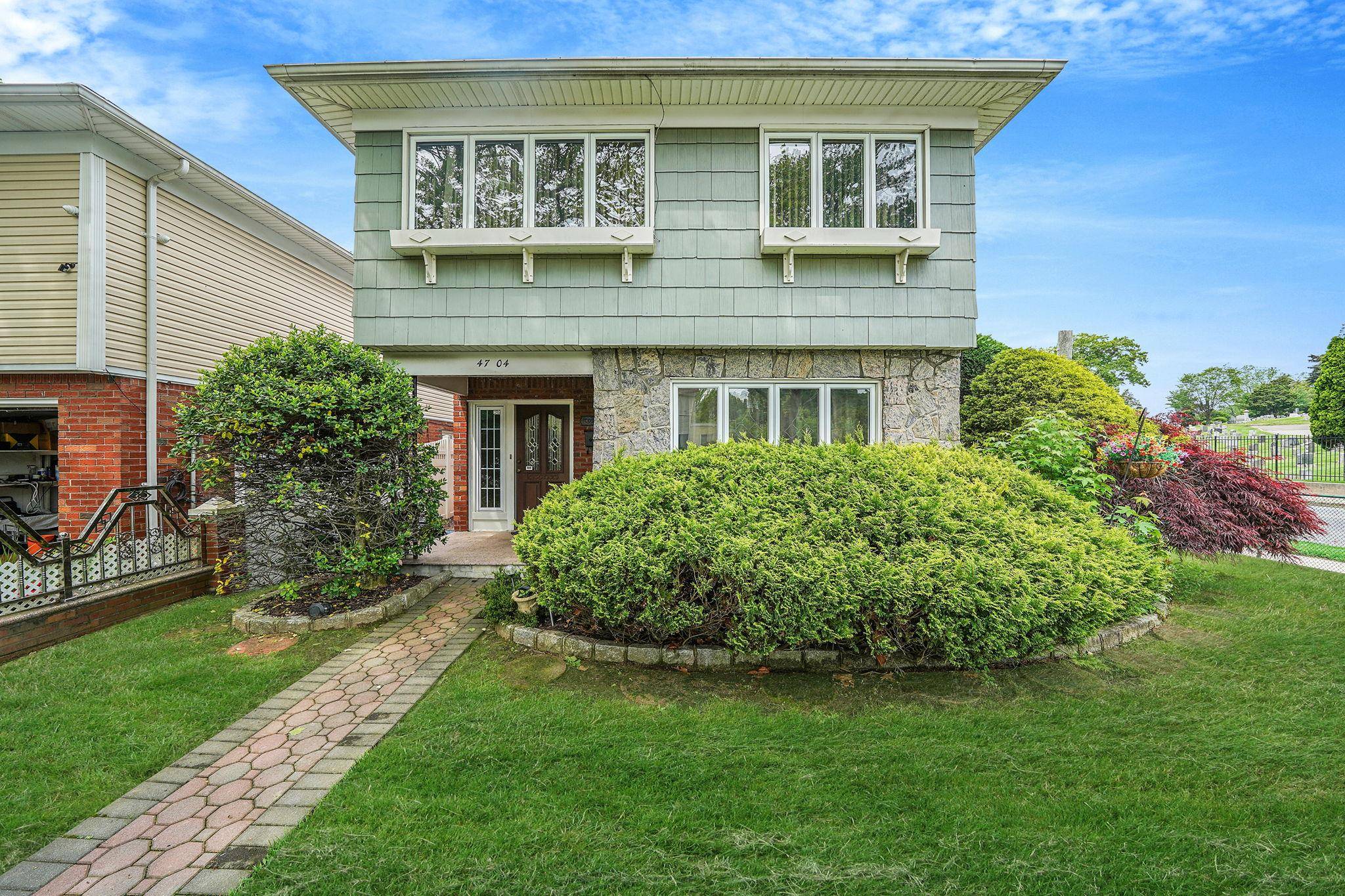 Don't miss this Lovely Home situated on a Quiet Block near Kissena Park !