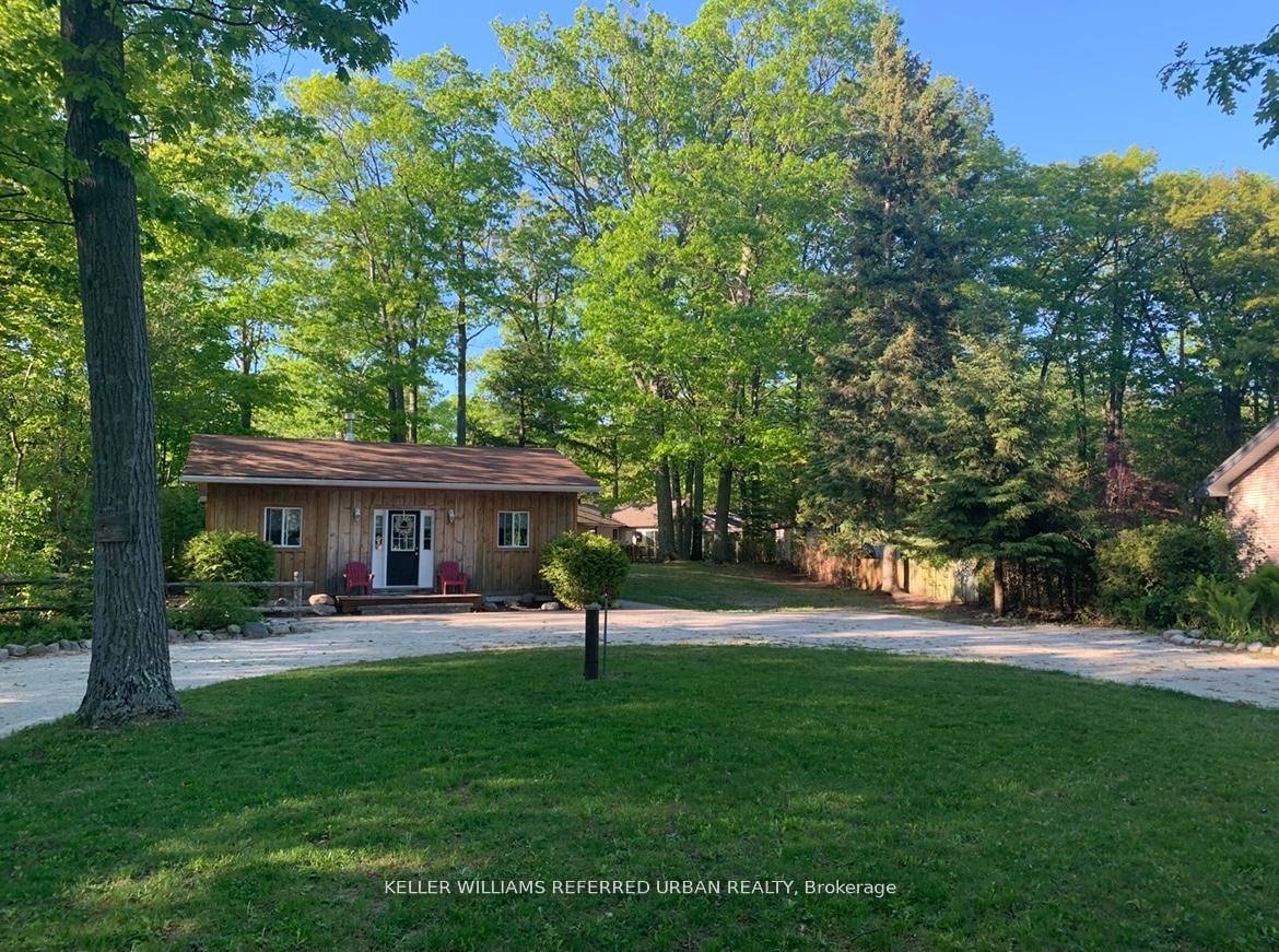 Nestled just steps away from the serene shores of Georgian Bay, this charming 4 season two bedroom cottage offers a perfect blend of rustic charm and modern comfort.