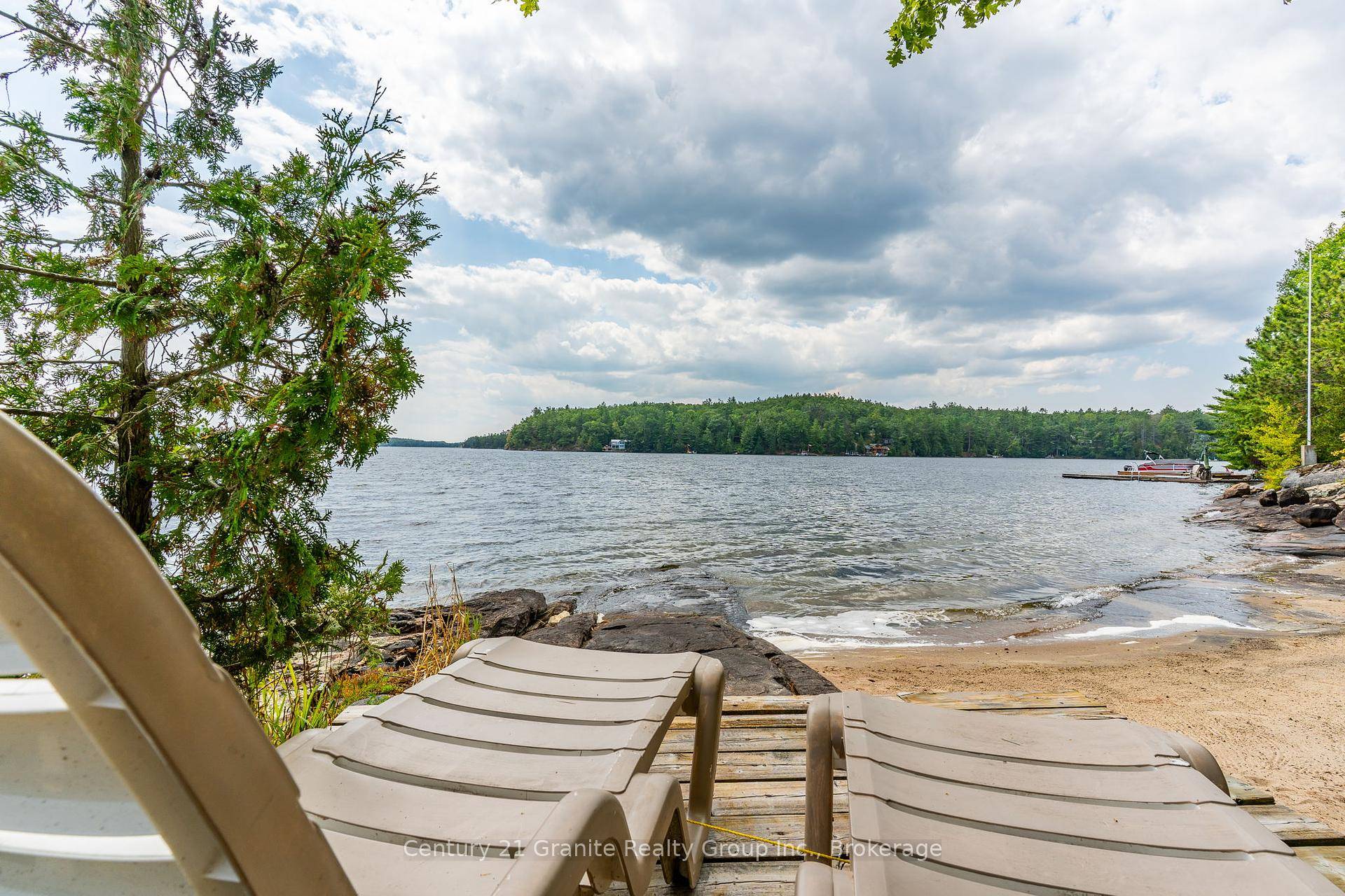 Escape to your own slice of paradise on sought after Gull Lake.