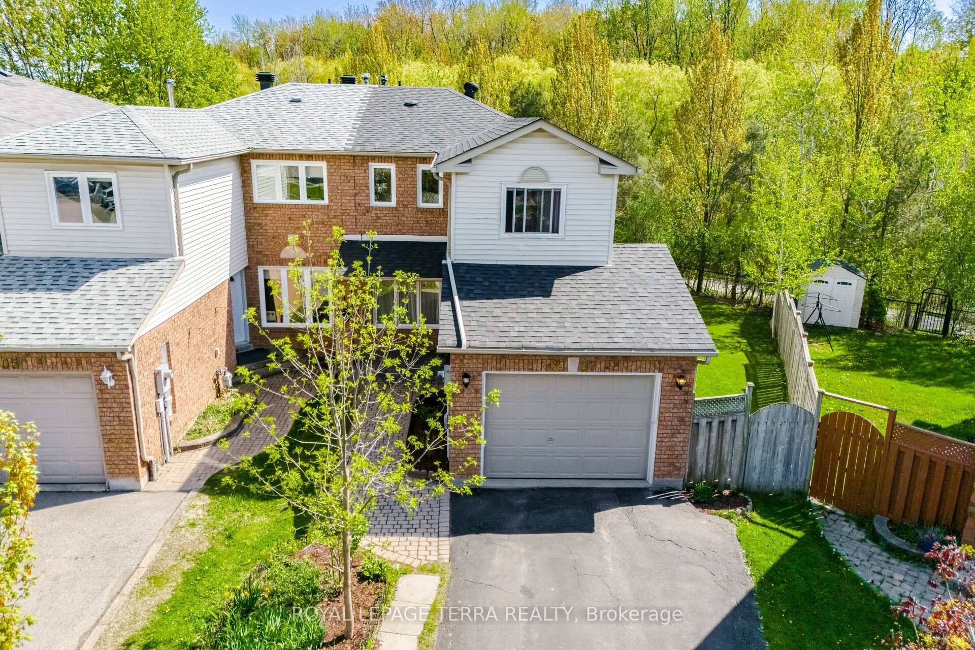 Elegant End Unit Townhome on Oversized Ravine Lot Feels Just Like a Semi !