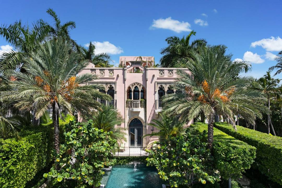A fairytale castle in Coconut Grove, designed by Ralph Portuondo, where Gothic grandeur meets modern sophistication.