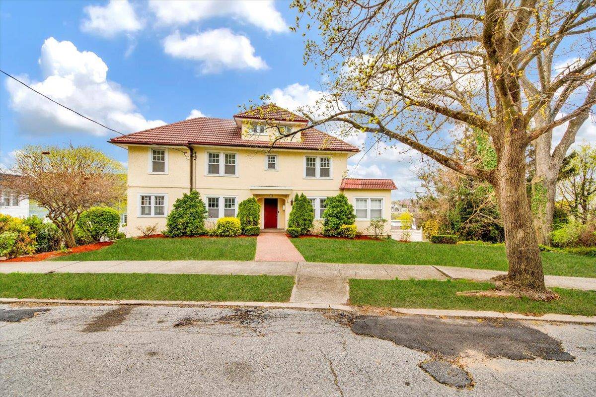 Welcome to 12 Pilgrim Avenue, a beautifully maintained Mediterranean Colonial nestled in the highly sought after Colonial Heights section of Yonkers !