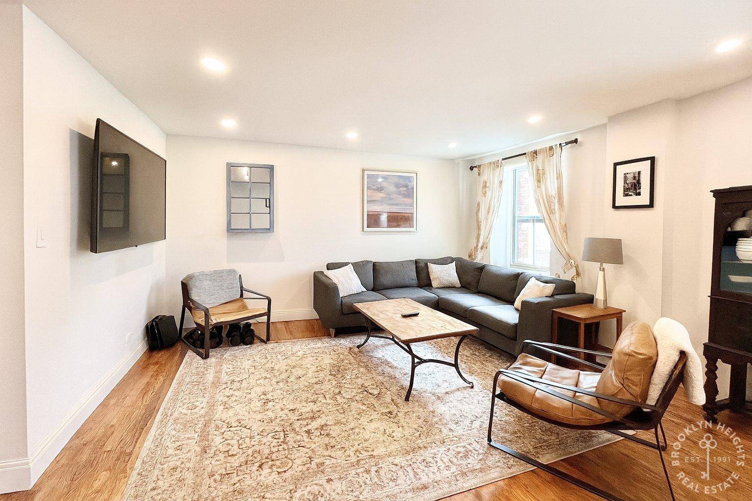 Nestled on a quiet, tree lined street in the heart of Brooklyn Heights, this beautifully renovated two bedroom, two bathroom residence offers both scale and serenity.