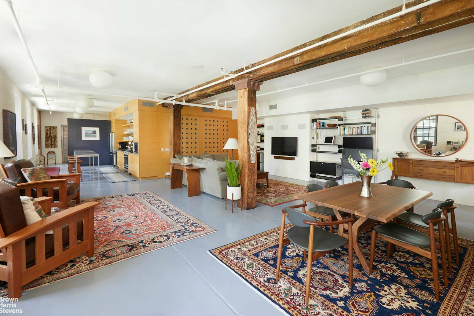 12 Oversized Windows Wrap around this corner unit in NW Tribeca.