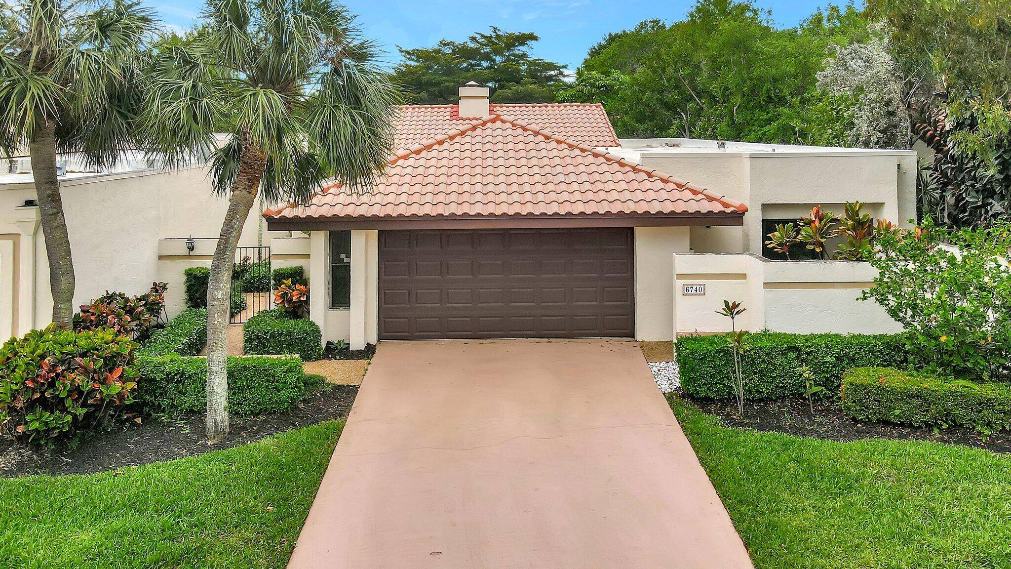 Nestled in the heart of Boca Raton, this updated waterfront home in Pradera offers elegance and comfort.