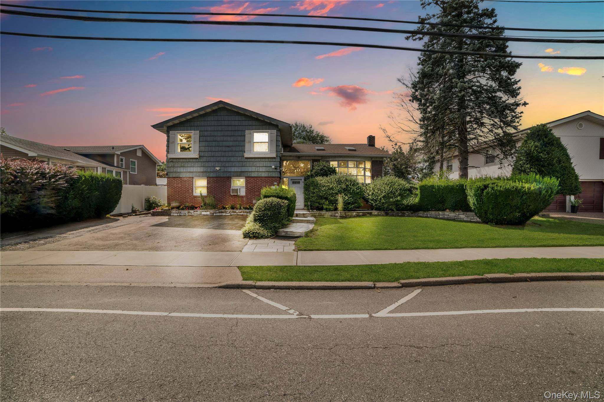 Welcome to this updated split level residence, a home where space and function come together beautifully.