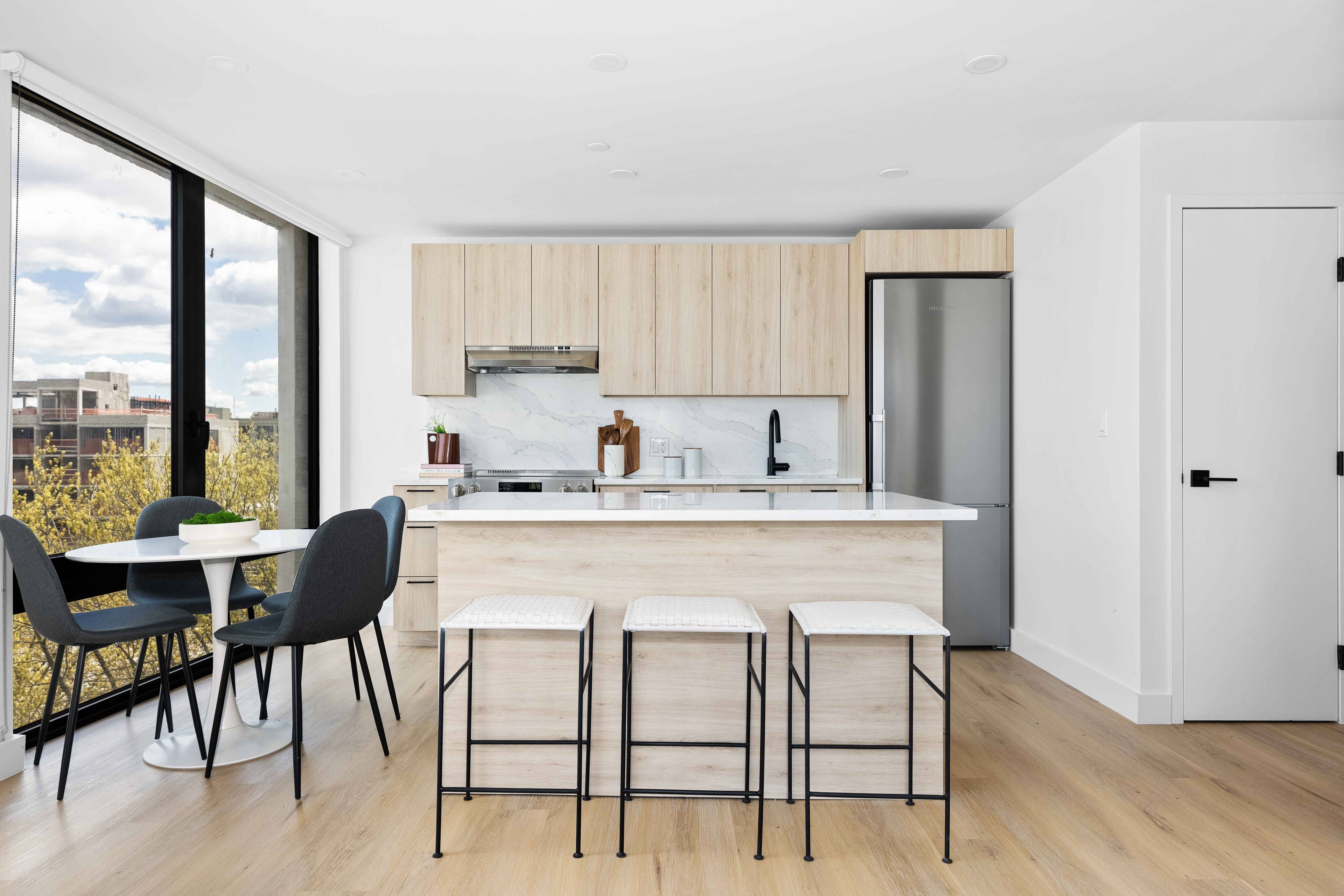 Beautiful two bedroom, two bathroom apartment featuring a one of a kind terrace, with direct Manhattan skyline views, oversized windows, matte black and Calcutta finishes, custom tiled bathrooms, spacious closets ...
