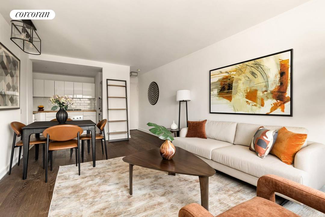 Experience southern light and sweeping city views from this high floor one bedroom home at 201 West 21st Street, Apartment 12J, in the heart of Chelsea.