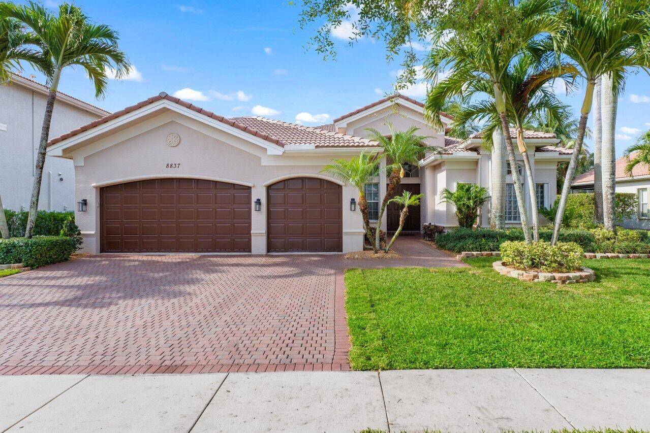 Gorgeous One Story Estate with Pool Spa on a Stunning Lake Lot in Canyon Isles.