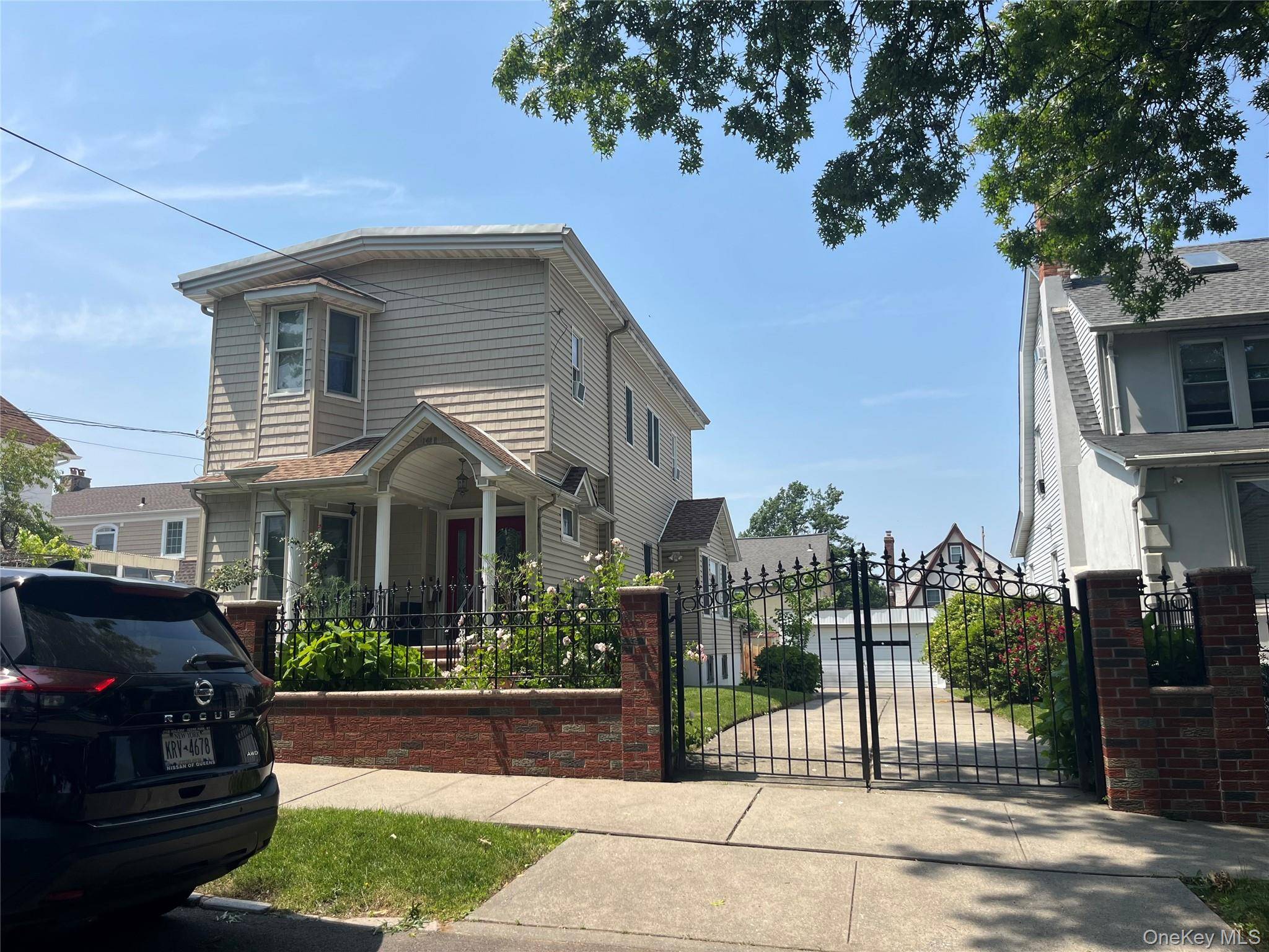 Rare opportunity ! ! Updated, South Facing, Legal 2 family in a quiet residential section of Whitestone.