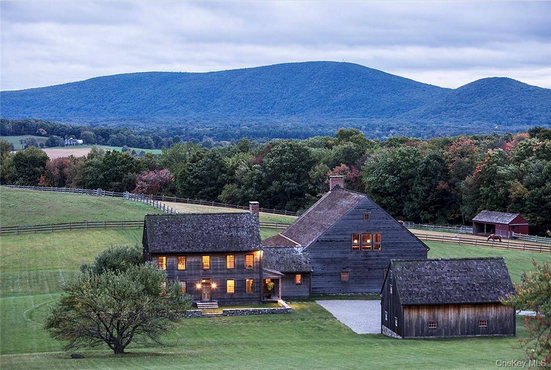 Set among the beautiful rolling hills on 203 acres is this private estate that takes you back in time.