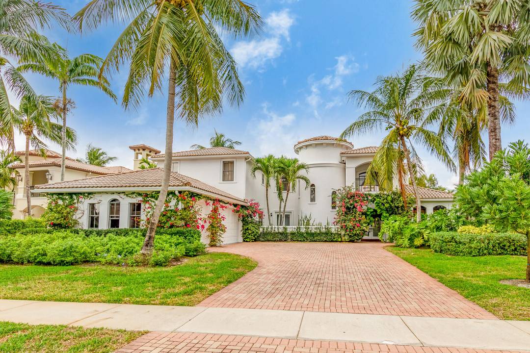 Discover a meticulously updated stately home in a prestigious, man gated community.