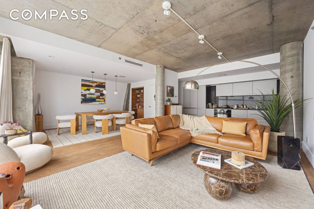 Sleek, ultra modern LES condo with refined industrial finishes and exceptional natural light.