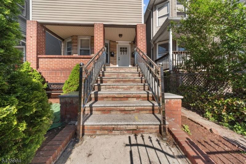Beautifully renovated two family home offering modern updates and functional living.