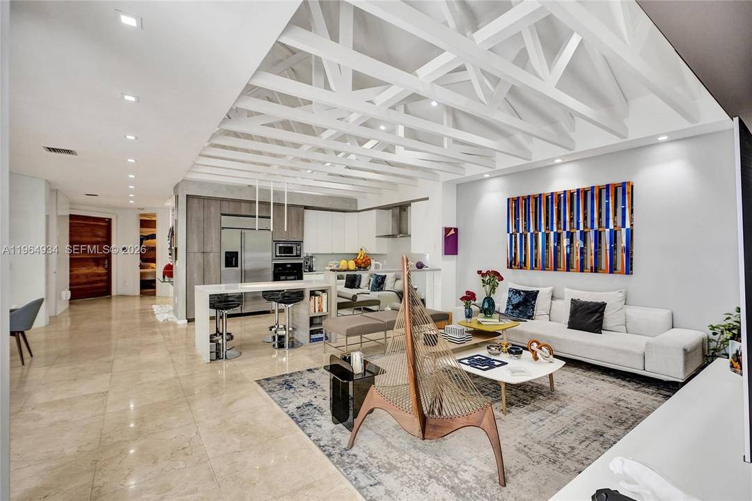 Welcome to one of the most architecturally striking homes in Presidential Estates.