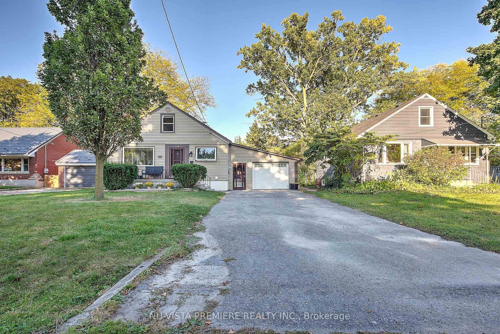 Nestled on a quiet street in the highly sought after Kensal Park neighbourhood, just steps from the Thames River, this meticulously maintained 1.