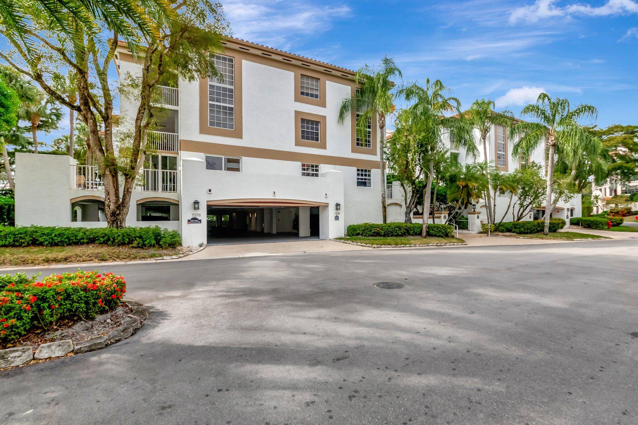 Enjoy the Florida lifestyle in this gorgeous 1st floor condo in Boca Grove Country Club.