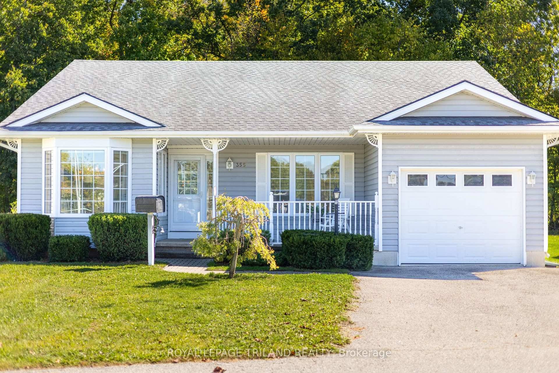 GRAND COVE SITE BUILT HOME WITH GARAGE BACKING ONTO MATURE WOODS VIEW OF THE WATER GRAND COVE NATURE POND FROM FRONT OF HOME !