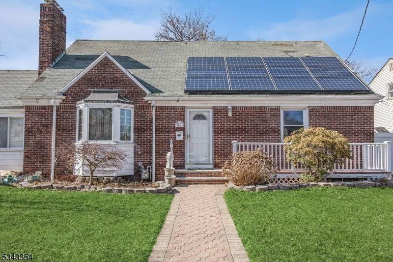 Welcome to this amazing four bedroom, three bath, brick extended Cape Cod home located in the heart of Sunnyside, Linden.