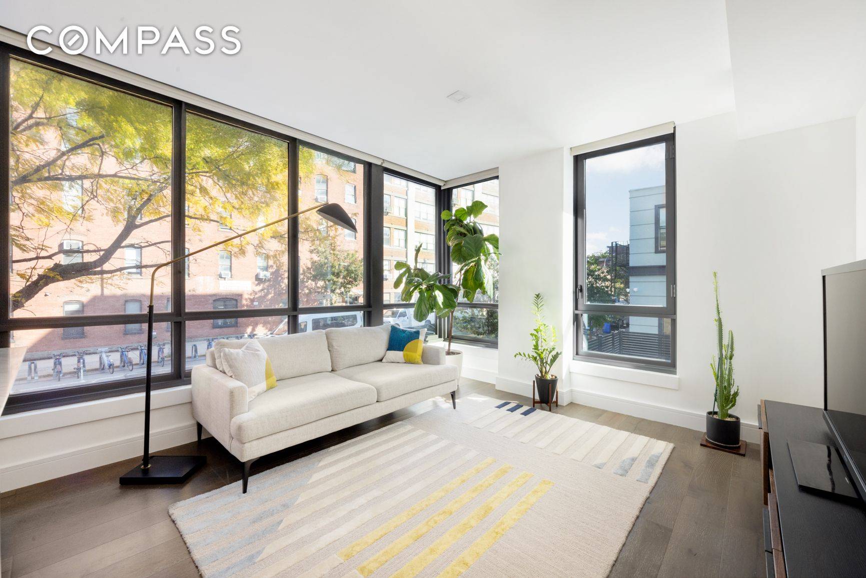 Sun Filled Corner Two Bedroom Condo with Floor to Ceiling Windows Private Parking Available Welcome to Residence 2B at 50 Greenpoint Condominium an exceptional, light filled corner home offering sweeping ...