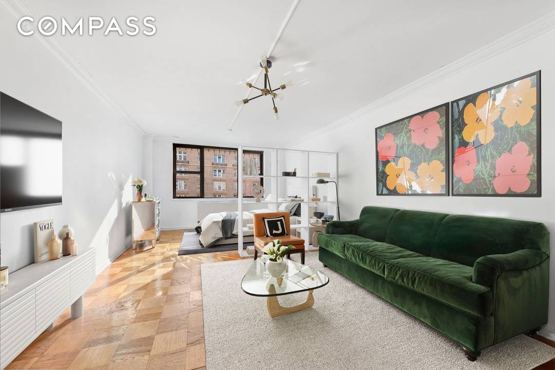 Welcome to this exceptionally large south facing studio in one of Gramercy's most sought after full service co ops where thoughtful design, abundant natural light, and a rarely available chef's ...