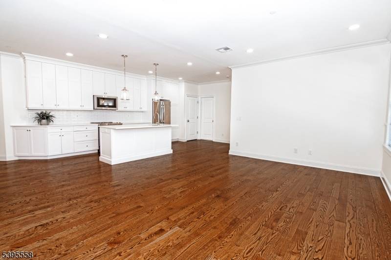 A rare opportunity to live in one of Downtown Summit's most sought after luxury buildings, where refined design meets unmatched convenience.