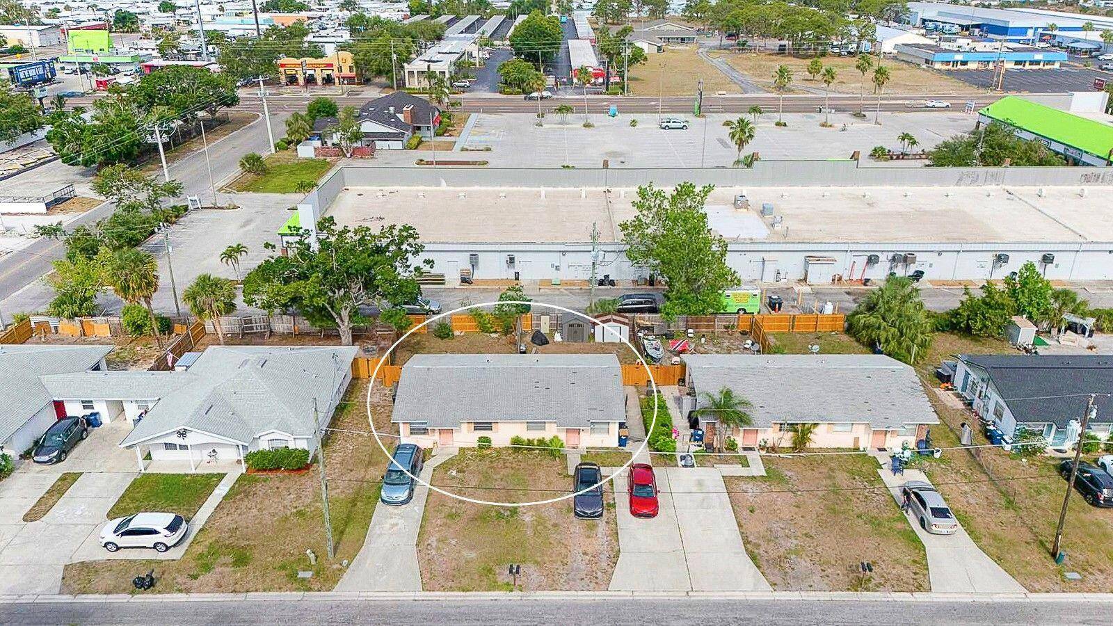 Income Producing 2 Bed 1 Bath Duplex Prime Investment Opportunity !