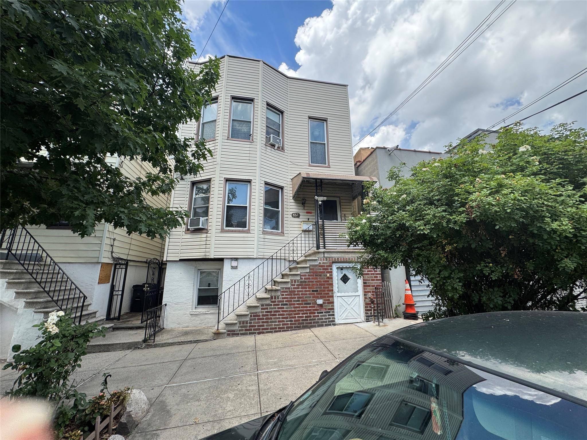 Come see this charming 2 family home in the desirable Van Nest Morris Park area of the Bronx !