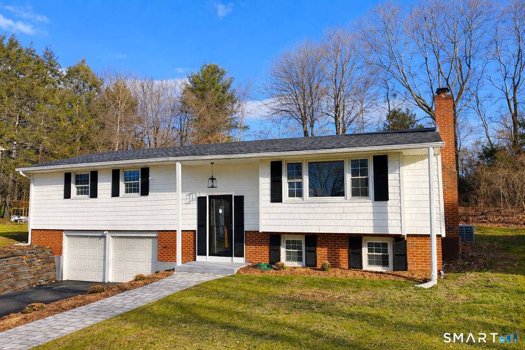 Experience refined living in this exceptionally renovated raised ranch, ideally situated in one of West Hartford's most desirable neighborhoods.