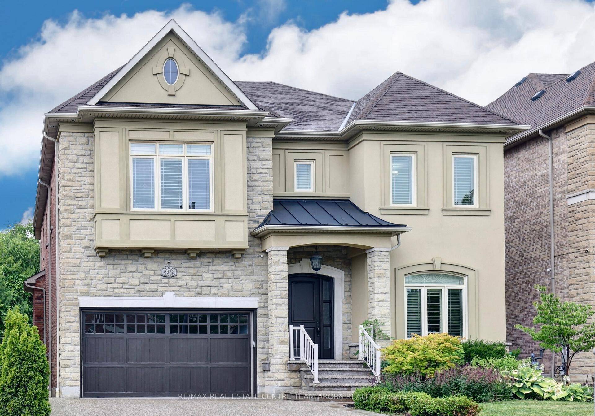 This stunning, executive 2 storey detached home with Ravine lot is nestled in the prestigious Meadowvale Village community.