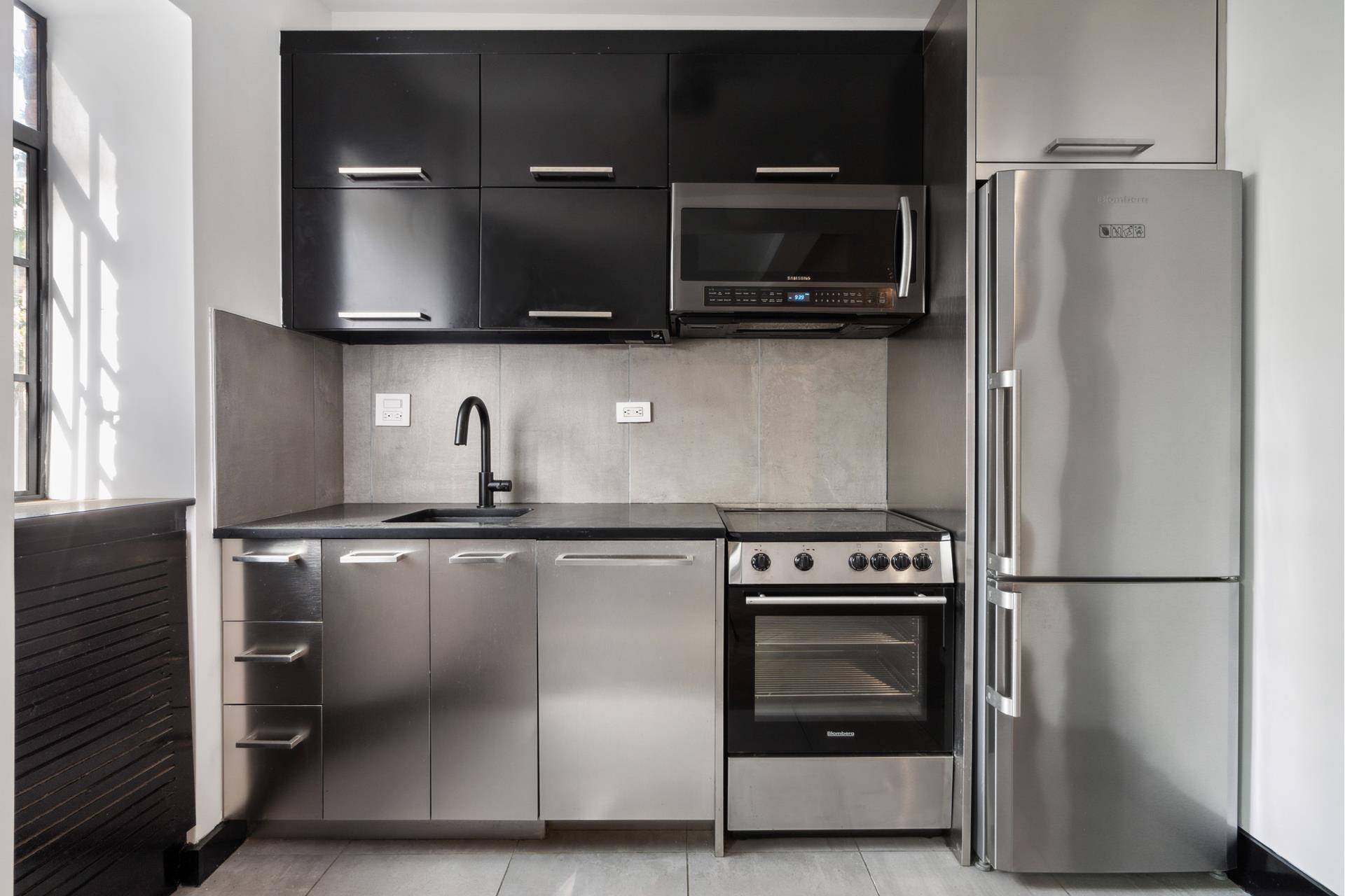 TENANT OCCUPIED UNIT Welcome to your new home at 25 Monroe Place, where modern convenience meets classic charm.