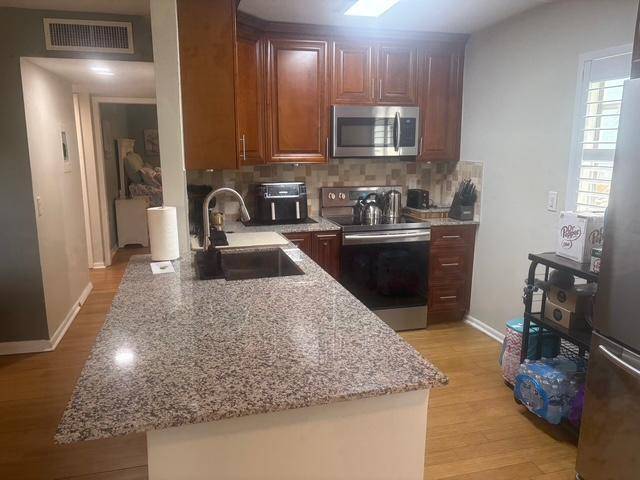 Welcome to this bright and beautifully updated 2 bedroom, 2 bath condo located in the highly desirable 55 community of Kings Point in Delray Beach.