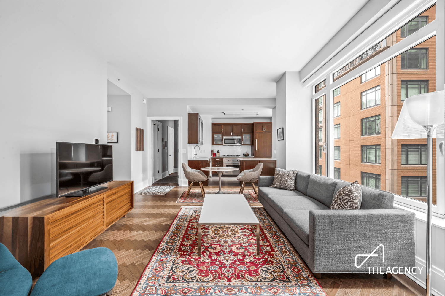 Welcome to this luxurious, sun drenched two bedroom, two bath residence at The Harrison.