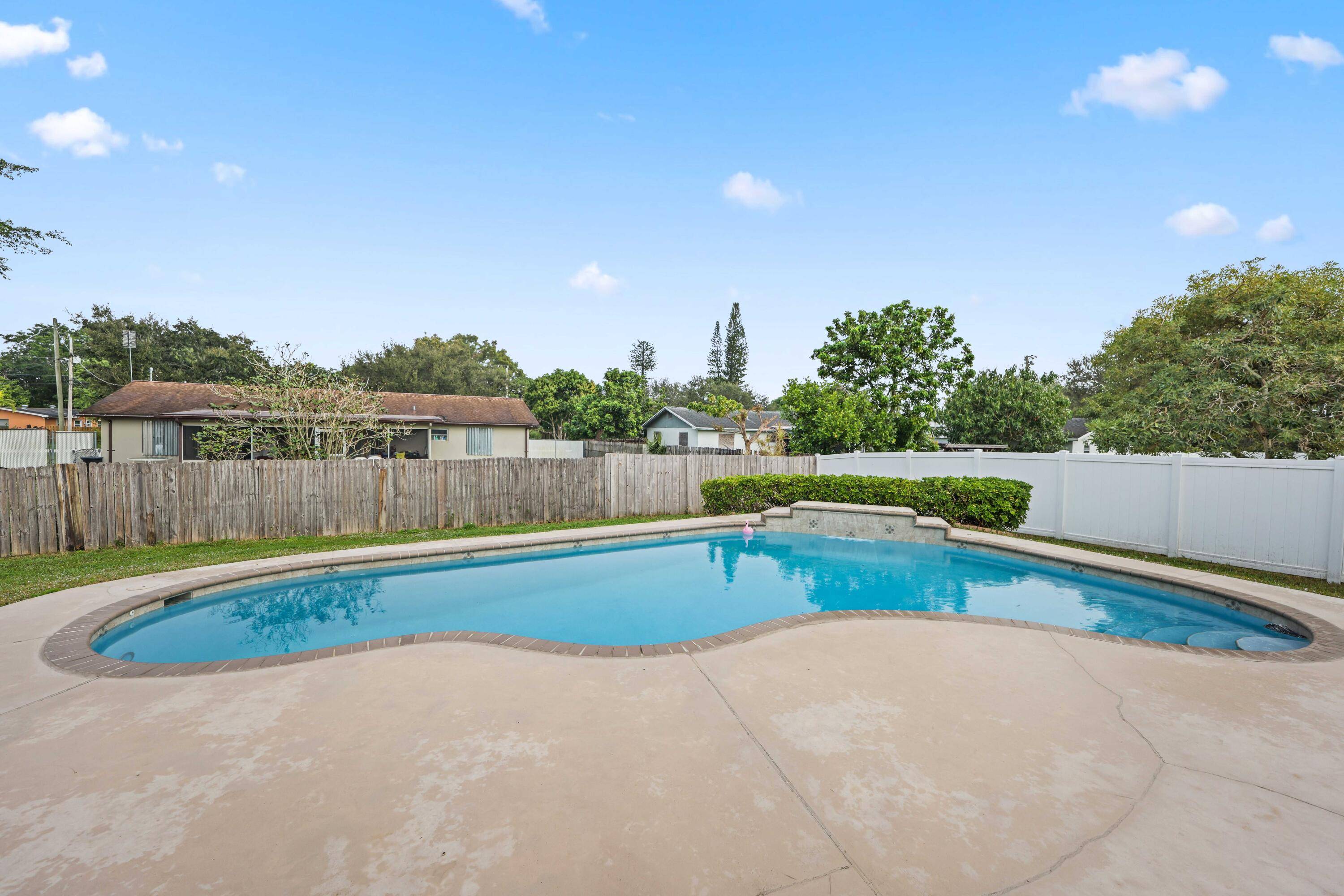 LUXURY POOL NEW ROOF, NEW IMPACT WINDOWS NEW PAINT NEW A C NEW APPLIANCES NEW WINDOW TREATMENTS NEW LIGHTS FANS HURRY TO SEE READY TO MOVE IN ENJOY This is ...