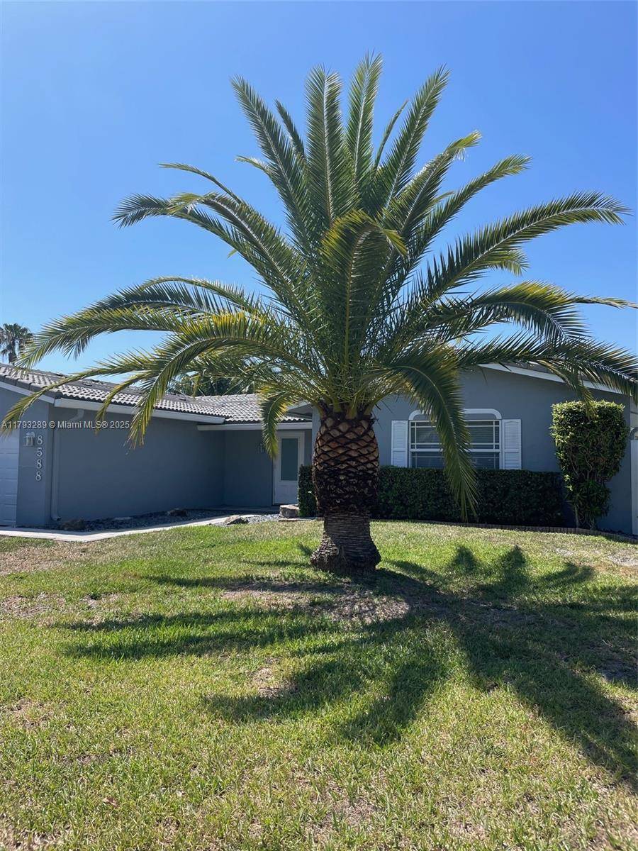 Spacious 4 2 Single Family Pool Home on a Canal in the center of Coral Springs, in the Highly Sought After FOREST HILLS neighborhood.