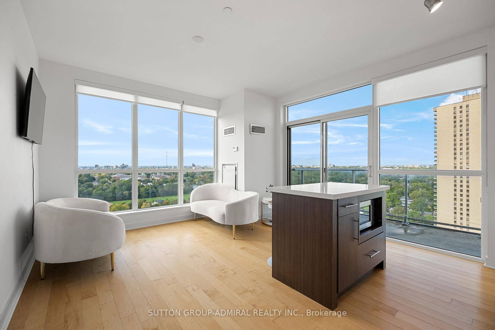 Soaring views from this stunning corner penthouse in Neon Condos, located in the vibrant Yonge andEglinton neighborhood, at the core of the city.