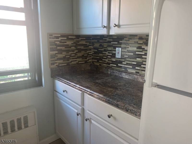 LARGE STUDIO W TERRACE LOCATED ONTHE 7TH FLOOR OF AN ELEVATOR BUILDING, JUST A FEWBLOCKS AWAY FROM THE JOURNAL SQ PATH TRAIN STATION.