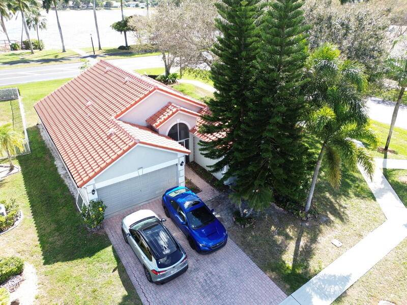 NEW ROOF ! Move in ready, gorgeous corner single family home with lake view.