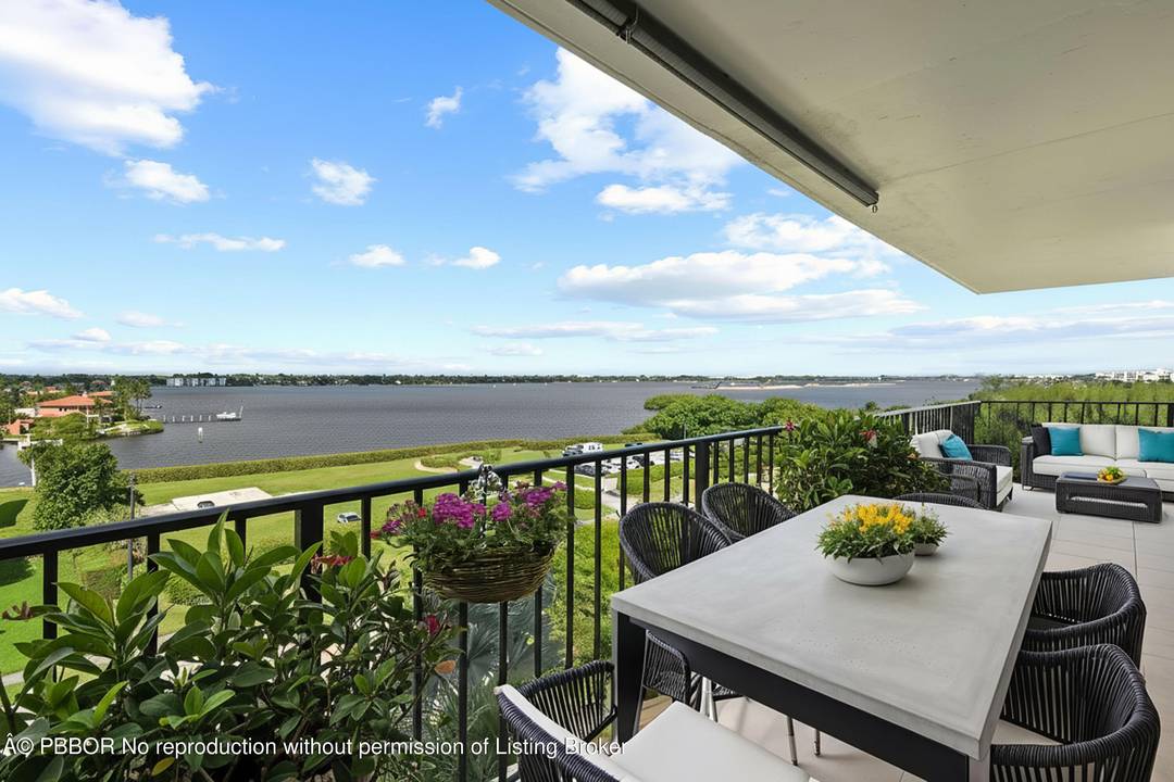 Experience the essence of coastal living in this stunning corner condo, featuring a wrap around balcony that showcases sweeping Intracoastal views and serene glimpses of the ocean.