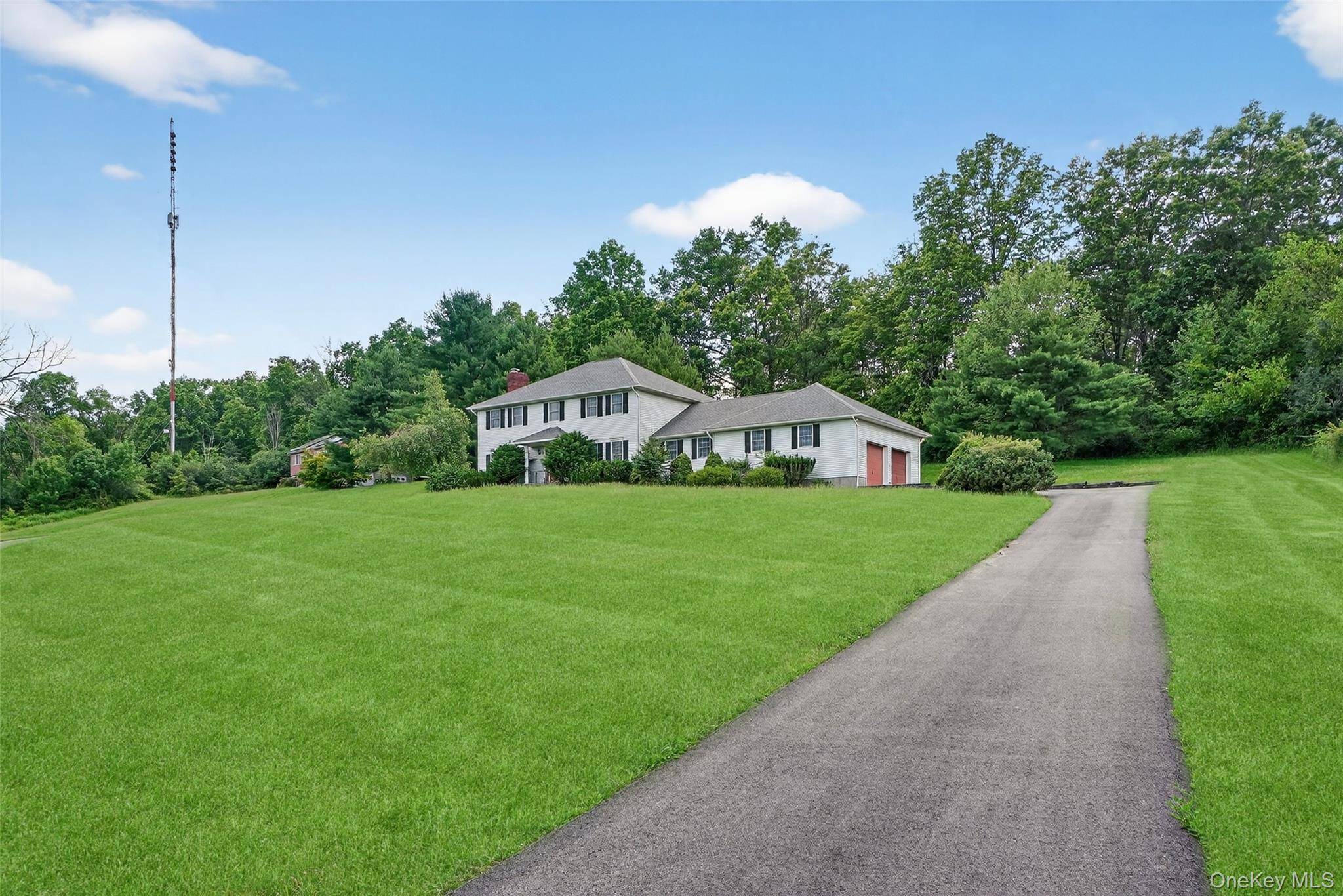This expansive Colonial home offers over 3, 200 sq ft of beautifully maintained living space, nestled on a peaceful 1.