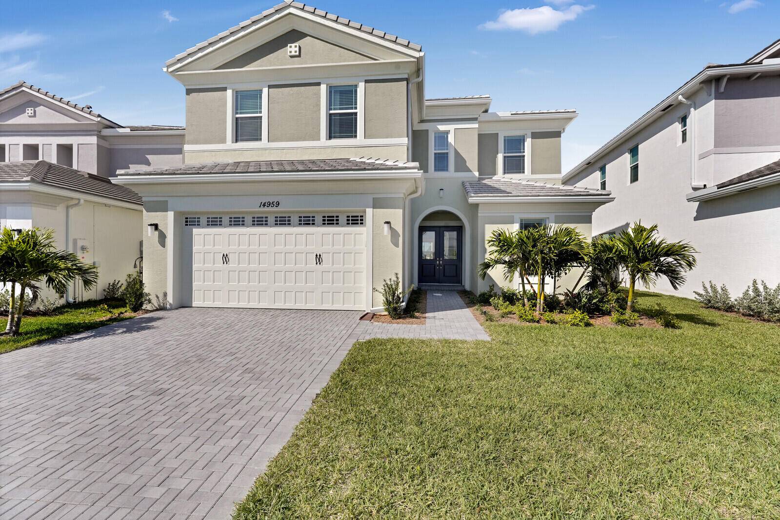 4 bedrooms den loft home located in the prestigious community of Westlake in the ORCHARDS.