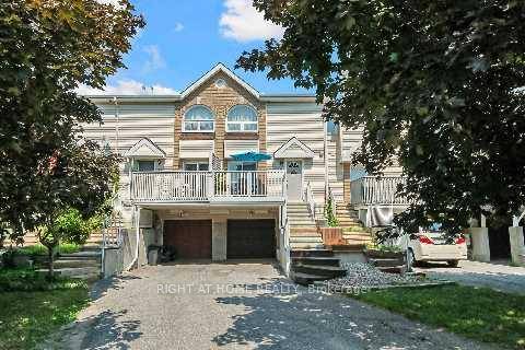 Well Maintained FRESHLY painted FREEHOLD Townhome Ideal for Families or Investors !